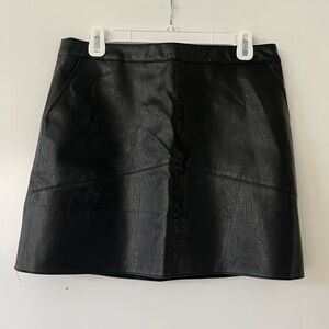 Black “leather” mini skirt, with pockets!